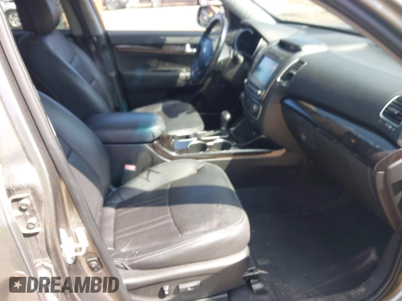 2014 Kia Sorento SX with VIN 5XYKWDA79EG448183, listed as a IAAI auction lot 42023625 with 109,188 mi miles and . Bid and sale history available at DreamBid. Image 5.