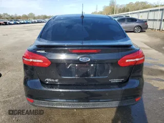 2016 Ford Focus Titanium with VIN 1FADP3J22GL201721, listed as a Copart auction lot 50633795 with 29,801 mi miles and Salvage title. Bid and sale history available at DreamBid. Image 6.