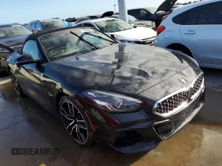 2020 BMW Z4 sDrive30i with VIN WBAHF3C06LWW75400, listed as a Copart auction lot 74297024 with 34,559 mi miles and Salvage Title. Bid and sale history available at carsss.com. Image 4.
