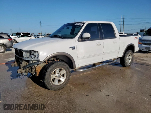 2002 Ford F-150 XLT with VIN 1FTRW08692KD89789, listed as a Copart auction lot 52621555 with 150,012 mi miles and Salvage Title. Bid and sale history available at carsss.com. Image 1.