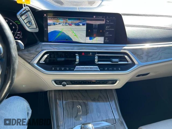 2019 BMW X7 xDrive50i z VIN 5UXCX4C53KLB39548, wystawiony jako Copart lot #54152375 z przebiegiem 159 191 mil mil oraz Czysty tytuł • Clean title. Historia ofert i sprzedaży dostępna na DreamBid. Obrazek 10.