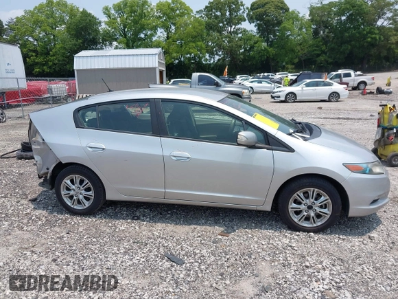2010 Honda Insight EX with VIN JHMZE2H7XAS018581, listed as a IAAI auction lot 42398439 with 188,692 mi miles and . Bid and sale history available at DreamBid. Image 14.