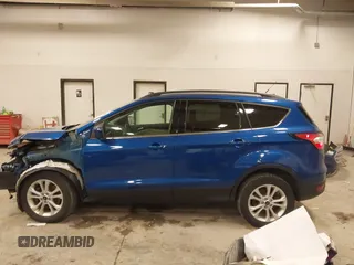 2018 Ford Escape SE with VIN 1FMCU9GD4JUA83470, listed as a IAAI auction lot 41272882 with 105,661 mi miles. Bid and sale history available at carsss.com. Image 14.