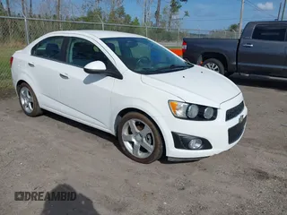 2016 Chevrolet Sonic LTZ z VIN 1G1JE5SBXG4160349, wystawiony jako IAAI lot #41725051 z przebiegiem 115 882 mil mil oraz . Historia ofert i sprzedaży dostępna na DreamBid. Obrazek 1.