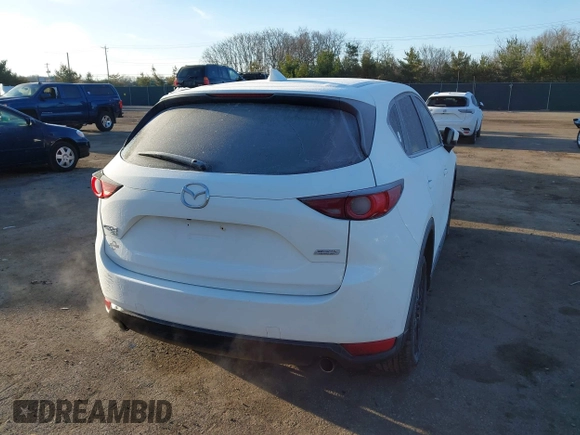 2017 Mazda CX-5 Touring with VIN JM3KFBCL8H0136601, listed as a IAAI auction lot 41830355 with 113,677 mi miles. Bid and sale history available at carsss.com. Image 4.
