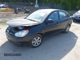 2009 Hyundai Accent Auto GLS z VIN KMHCN46C39U334712, wystawiony jako IAAI lot #42334874 z przebiegiem 193 090 mil mil oraz . Historia ofert i sprzedaży dostępna na DreamBid. Obrazek 2.