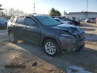 2015 Jeep Cherokee Latitude with VIN 1C4PJLCB9FW518043, listed as a Copart auction lot 42286215 with 119,837 mi miles and Salvage Title. Bid and sale history available at carsss.com. Image 4.