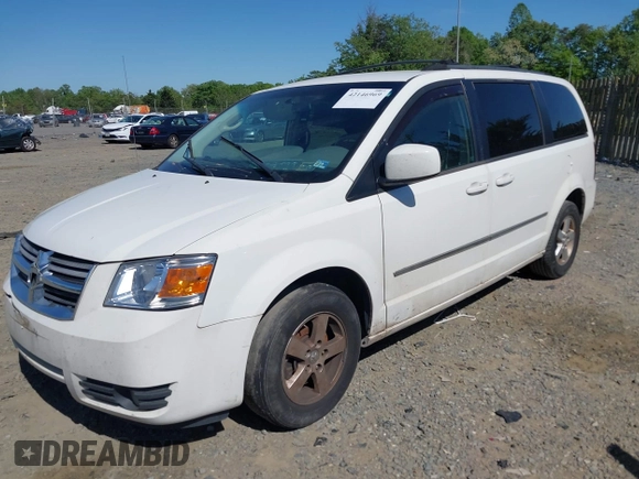 2010 Dodge Grand Caravan SXT with VIN 2D4RN5D12AR210330, listed as a IAAI auction lot 42146969 with 233,607 mi miles and . Bid and sale history available at DreamBid. Image 2.