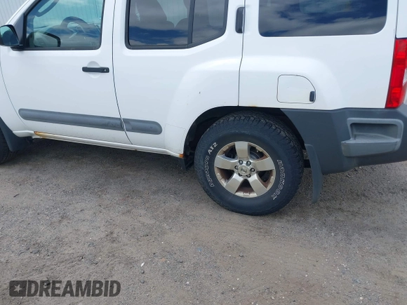 2011 Nissan Xterra S with VIN 5N1AN0NW2BC516828, listed as a IAAI auction lot 42251064 with 212,470 mi miles and . Bid and sale history available at DreamBid. Image 18.