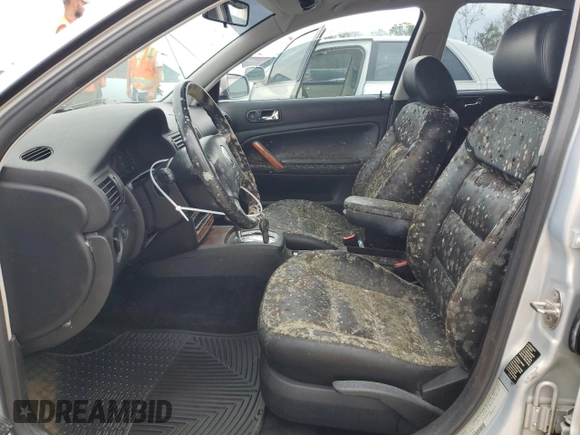 1999 Volkswagen Passat GL z VIN WVWMD63B1XE216281, wystawiony jako Copart lot #75200694 z przebiegiem Nie podano mil oraz Nie do naprawy • Non repairable. Historia ofert i sprzedaży dostępna na DreamBid. Obrazek 7.