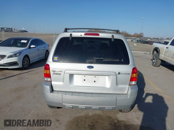 2006 Ford Escape Hybrid with VIN 1FMCU96H96KA25796, listed as a IAAI auction lot 41796914 with 119,809 mi miles and . Bid and sale history available at DreamBid. Image 6.