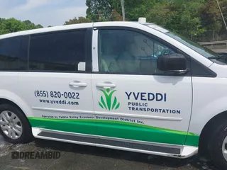2014 Dodge Grand Caravan American Value with VIN 2C4RDGBG6ER380568, listed as a IAAI auction lot 41683180 with 303,612 mi miles and . Bid and sale history available at DreamBid. Image 13.