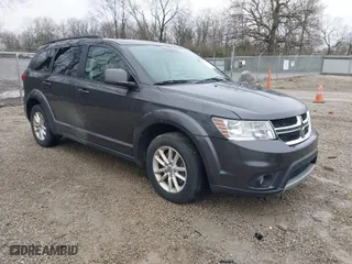 2016 Dodge Journey SXT with VIN 3C4PDCBG9GT137742, listed as a IAAI auction lot 41879431 with 207,443 mi miles. Bid and sale history available at carsss.com. Image 1.