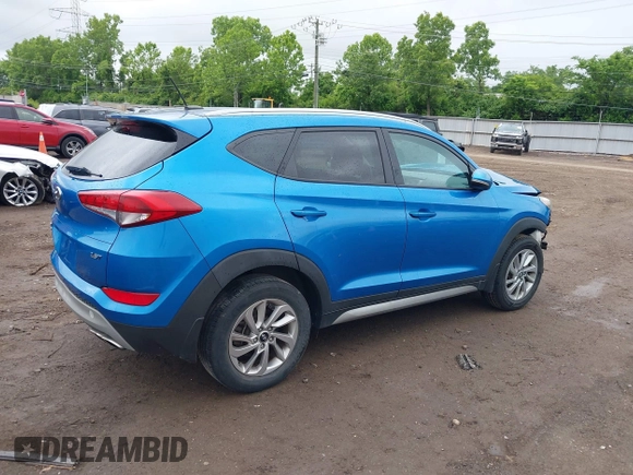2017 Hyundai Tucson Sport z VIN KM8J33A23HU319048, wystawiony jako IAAI lot #42340603 z przebiegiem 51 738 mil mil oraz . Historia ofert i sprzedaży dostępna na DreamBid. Obrazek 4.