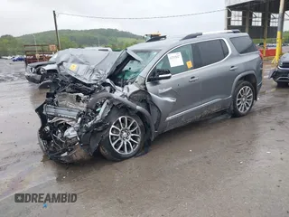 2021 GMC Acadia Denali z VIN 1GKKNXLS1MZ160927, wystawiony jako IAAI lot #42335027 z przebiegiem 60 014 mil mil oraz . Historia ofert i sprzedaży dostępna na DreamBid. Obrazek 16.