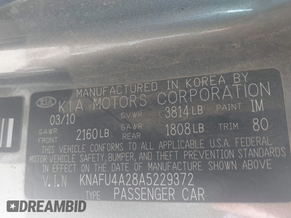 2010 Kia Forte EX with VIN KNAFU4A28A5229372, listed as a IAAI auction lot 41911118 with 166,084 mi miles. Bid and sale history available at carsss.com. Image 9.