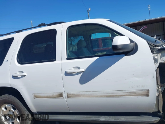 2013 Chevrolet Tahoe LT with VIN 1GNSCBE07DR256584, listed as a IAAI auction lot 39068684 with 139,897 mi miles and . Bid and sale history available at DreamBid. Image 14.