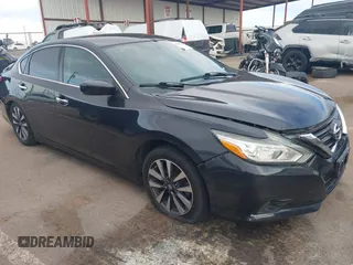 2017 Nissan Altima SV with VIN 1N4AL3AP0HC277398, listed as a IAAI auction lot 40918944 with 214,412 mi miles and . Bid and sale history available at carsss.com. Image 1.