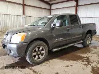 2010 Nissan Titan LE with VIN 1N6AA0EC2AN325657, listed as a Copart auction lot 88307625 with 147,010 mi miles and Salvage Title. Bid and sale history available at carsss.com. Image 1.