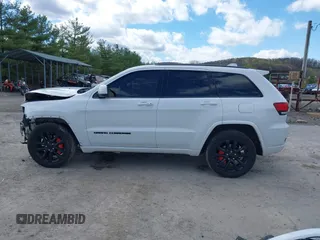 2021 Jeep Grand Cherokee Laredo E with VIN 1C4RJFAG6MC678713, listed as a IAAI auction lot 42015949 with 54,224 mi miles and . Bid and sale history available at DreamBid. Image 15.