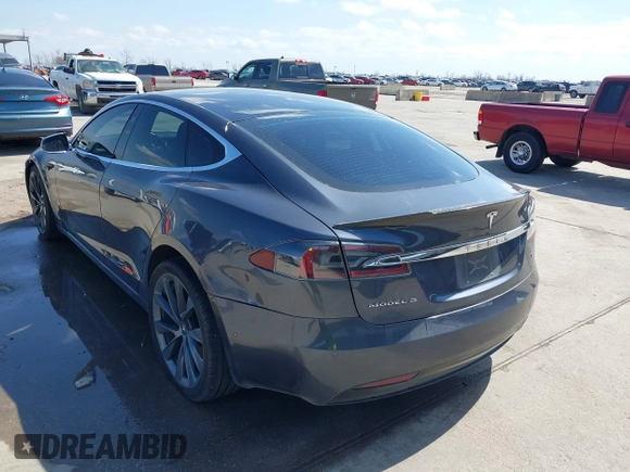 2017 Tesla Model S 100D with VIN 5YJSA1E29HF204881, listed as a IAAI auction lot 41785767 with 146,523 mi miles and . Bid and sale history available at DreamBid. Image 3.
