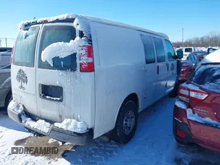 2018 Chevrolet Express Cargo Van with VIN 1GCWGAFG1J1195263, listed as a IAAI auction lot 41287882 with 71,475 mi miles. Bid and sale history available at carsss.com. Image 4.
