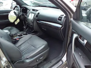 2014 Kia Sorento SX with VIN 5XYKWDA79EG440486, listed as a IAAI auction lot 41918486 with 167,288 mi miles and . Bid and sale history available at DreamBid. Image 5.