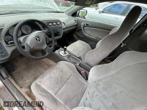 2003 Acura RSX z VIN JH4DC54873S002163, wystawiony jako Copart lot #59033805 z przebiegiem Nie podano mil oraz Szkody całkowita. Historia ofert i sprzedaży dostępna na DreamBid. Obrazek 9.