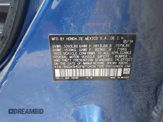 2015 Honda Fit LX with VIN 3HGGK5H52FM710434, listed as a IAAI auction lot 42022022 with 104,118 mi miles. Bid and sale history available at carsss.com. Image 9.