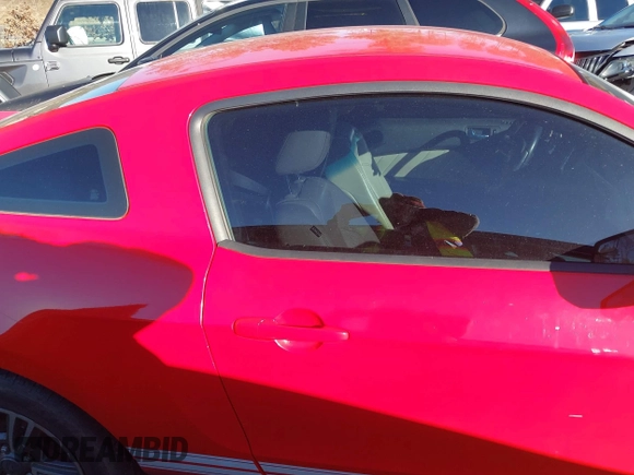 2012 Ford Mustang Premium with VIN 1ZVBP8AM0C5233157, listed as a IAAI auction lot 41580689 with 132,243 mi miles and . Bid and sale history available at DreamBid. Image 14.