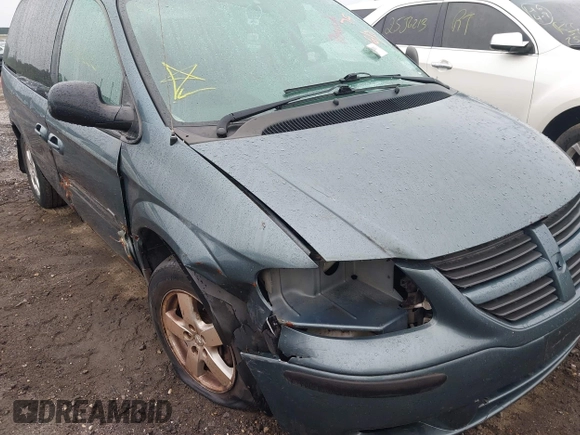 2005 Dodge Caravan SXT with VIN 1D4GP45R55B279825, listed as a IAAI auction lot 42532684 with 157,167 mi miles and . Bid and sale history available at DreamBid. Image 12.
