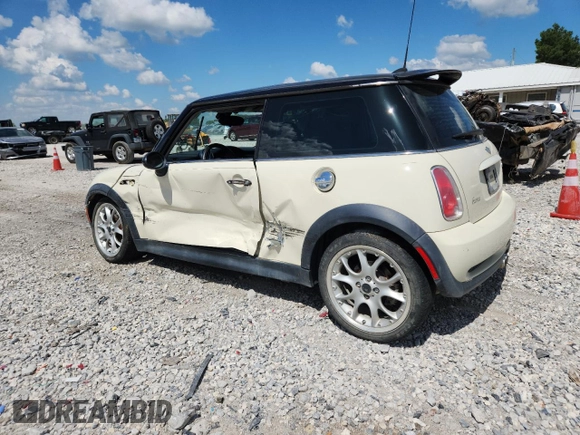 2006 MINI Hardtop S with VIN WMWRE33556TJ38543, listed as a Copart auction lot 62420145 with 105,656 mi miles and Salvage title. Bid and sale history available at DreamBid. Image 2.