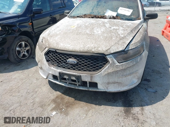 2013 Ford Police Interceptor with VIN 1FAHP2M80DG205024, listed as a IAAI auction lot 42740282 with 123,705 mi miles and . Bid and sale history available at DreamBid. Image 6.