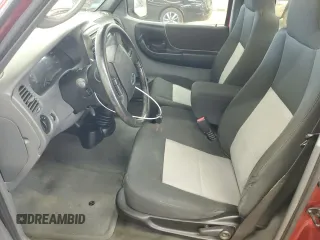 2009 Ford Ranger XL with VIN 1FTYR10D39PA15761, listed as a Copart auction lot 61823265 with 148,225 mi miles and Salvage title. Bid and sale history available at DreamBid. Image 7.
