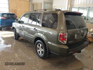2006 Honda Pilot EX-L with VIN 5FNYF187X6B026463, listed as a IAAI auction lot 41612181 with 242,828 mi miles and . Bid and sale history available at DreamBid. Image 3.