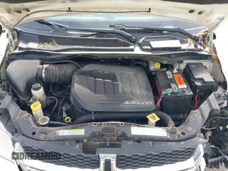 2012 Dodge Grand Caravan SXT with VIN 2C4RDGCGXCR358794, listed as a IAAI auction lot 42007316 with 212,518 mi miles and . Bid and sale history available at DreamBid. Image 10.