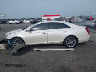 2013 Cadillac XTS with VIN 2G61N5S39D9145885, listed as a IAAI auction lot 42044388 with 181,645 mi miles and . Bid and sale history available at DreamBid. Image 15.