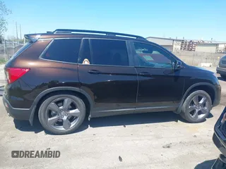 2021 Honda Passport Touring с VIN 5FNYF7H92MB010789, выставлен на аукционе IAAI как лот 42240529 с пробегом 43 184 миль миль и . История ставок и продаж доступна на DreamBid. Изображение 13.