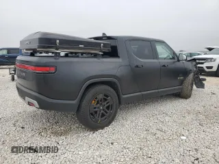 2022 Rivian R1T Adventure z VIN 7FCTGAAA5NN015734, wystawiony jako Copart lot #44019715 z przebiegiem 27 542 mil mil oraz Szkody całkowita. Historia ofert i sprzedaży dostępna na DreamBid. Obrazek 3.