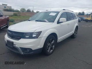 2015 Dodge Journey Crossroad with VIN 3C4PDCGG4FT697773, listed as a IAAI auction lot 41730507 with 151,247 mi miles and . Bid and sale history available at DreamBid. Image 2.