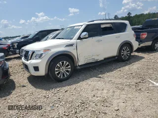 2019 Nissan Armada SL z VIN JN8AY2ND7KX009782, wystawiony jako Copart lot #59013905 z przebiegiem 97 915 mil mil oraz Czysty tytuł • Clean title. Historia ofert i sprzedaży dostępna na DreamBid. Obrazek 1.