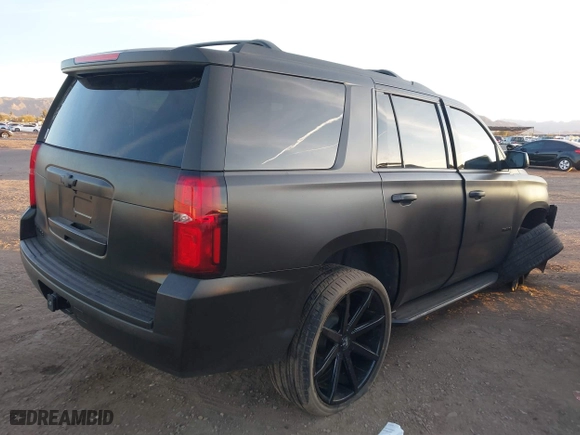 2017 Chevrolet Tahoe LS with VIN 1GNSCAKC6HR352429, listed as a IAAI auction lot 41607841 with 100,578 mi miles. Bid and sale history available at carsss.com. Image 4.