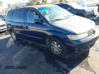 2004 Honda Odyssey EX z VIN 5FNRL18614B080980, wystawiony jako IAAI lot #41940014 z przebiegiem 233 465 mil mil oraz . Historia ofert i sprzedaży dostępna na DreamBid. Obrazek 13.