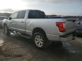 2016 Nissan Titan XD Platinum Reserve with VIN 1N6BA1F46GN513608, listed as a Copart auction lot 39489894 with 158,300 mi miles and Salvage Title. Bid and sale history available at carsss.com. Image 2.