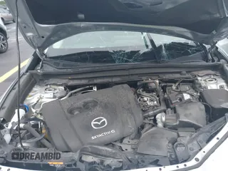 2021 Mazda CX-30 Select with VIN 3MVDMBBLXMM246600, listed as a IAAI auction lot 42418629 with 77,713 mi miles and . Bid and sale history available at DreamBid. Image 10.
