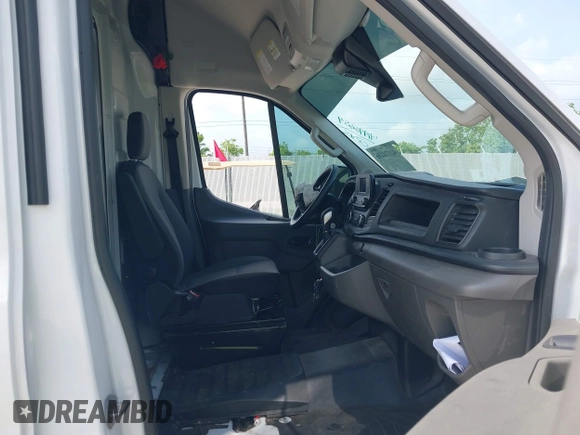 2023 Ford Transit Cargo z VIN 1FTLW3X86PKC12960, wystawiony jako IAAI lot #42174156 z przebiegiem 23 420 mil mil oraz . Historia ofert i sprzedaży dostępna na DreamBid. Obrazek 5.