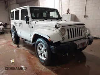 2014 Jeep Wrangler Unlimited Sahara with VIN 1C4BJWEG1EL326605, listed as a IAAI auction lot 41325037 with 135,824 mi miles. Bid and sale history available at carsss.com. Image 1.