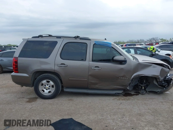 2012 Chevrolet Tahoe LS z VIN 1GNSCAE08CR323878, wystawiony jako IAAI lot #41936259 z przebiegiem 67 542 mil mil oraz . Historia ofert i sprzedaży dostępna na DreamBid. Obrazek 13.