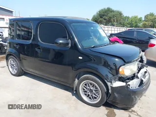 2009 Nissan Cube SL z VIN JN8AZ28R59T127819, wystawiony jako IAAI lot #40032802 z przebiegiem 138 891 mil mil oraz . Historia ofert i sprzedaży dostępna na DreamBid. Obrazek 1.