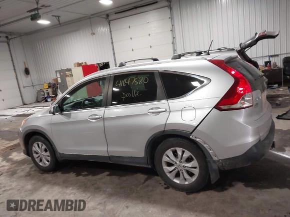 2013 Honda CR-V EX-L with VIN 2HKRM3H72DH504122, listed as a IAAI auction lot 41647580 with 217,451 mi miles and . Bid and sale history available at DreamBid. Image 14.